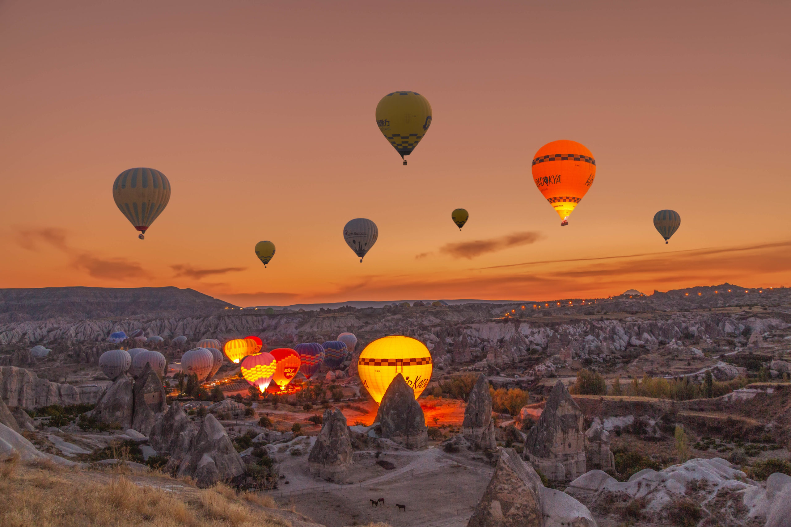 Cappadocia fairy chimneys balloons sunrise landscape Turkey