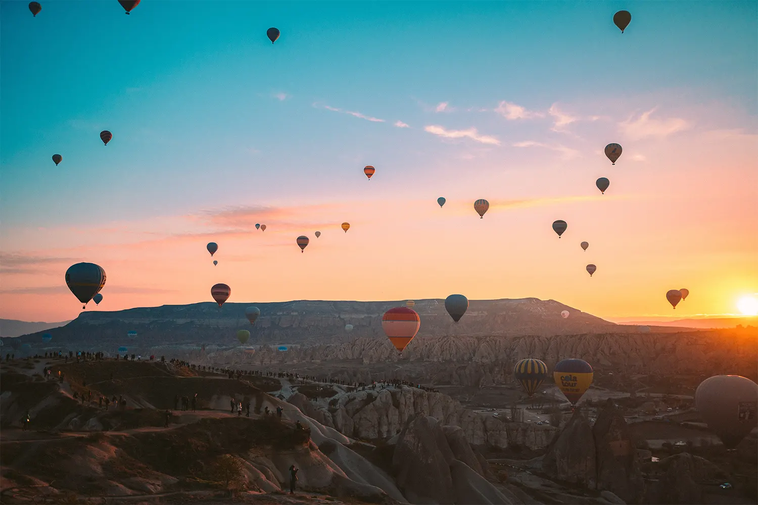 Hot air balloons Cappadocia valleys sunrise view Turkey