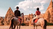 Couple on Horseback Tour